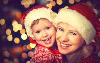 Holiday Dental Health | Mom and son smiling